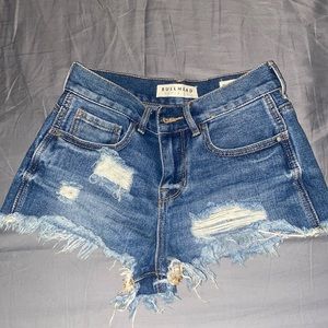 Blue distressed high waisted shorts